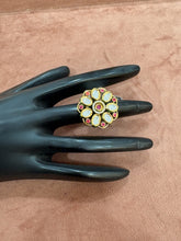 Elegant Floral Kundan Ring with Ruby and Green Enamel Accents